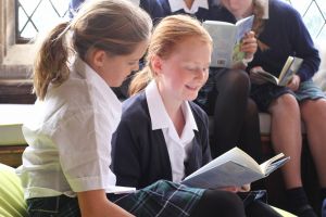 Pupils enjoying their bespoke book