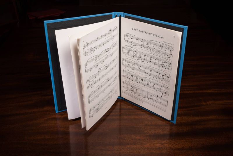 Gresham Books bespoke choir folder holding music