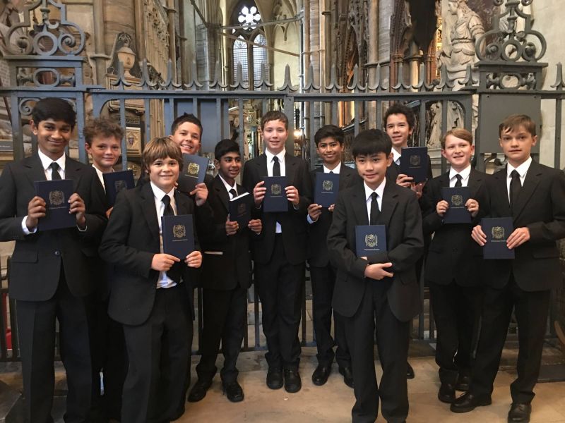 Westminster School - Boys holding hymn book