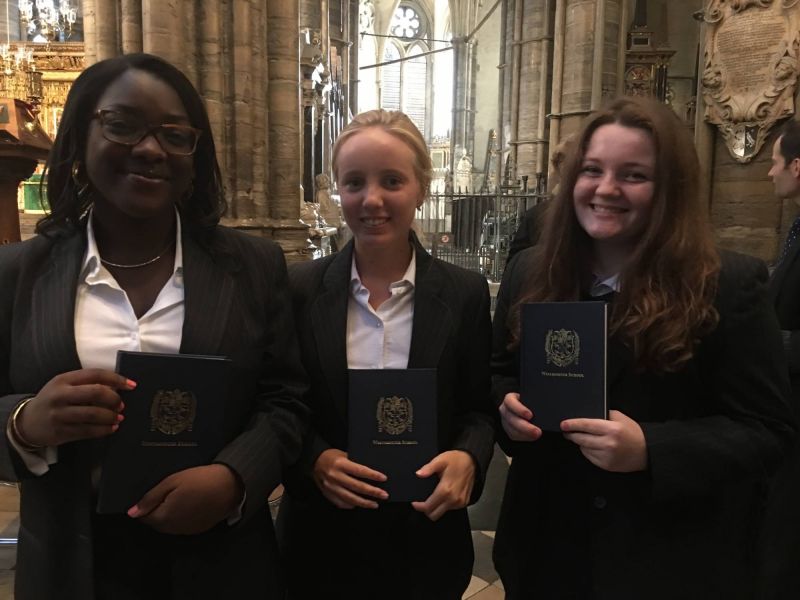 Westminster School - Girls holding hymn book