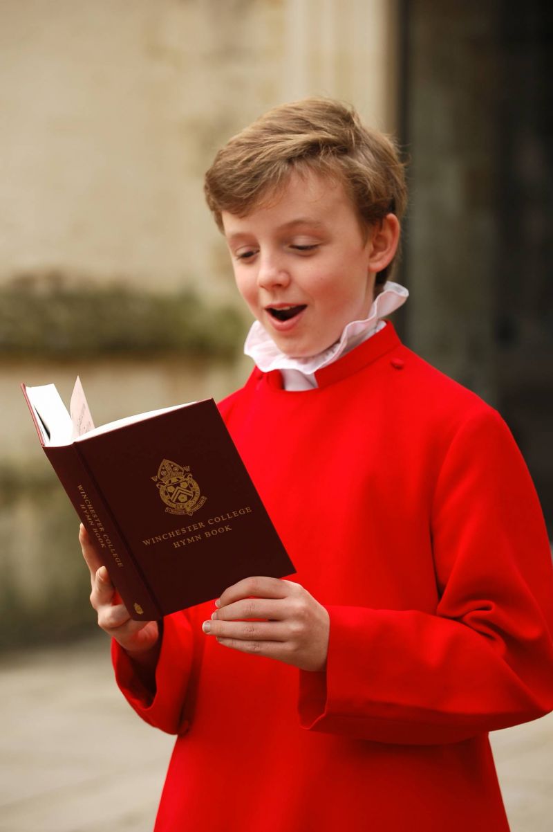 Winchester choir boy with hymn book